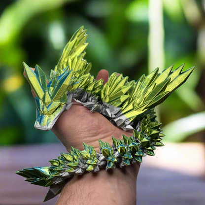 A dynamic shot of the dragon figurine with its wings spread wide, displaying the craftsmanship of the scales and wingspan.